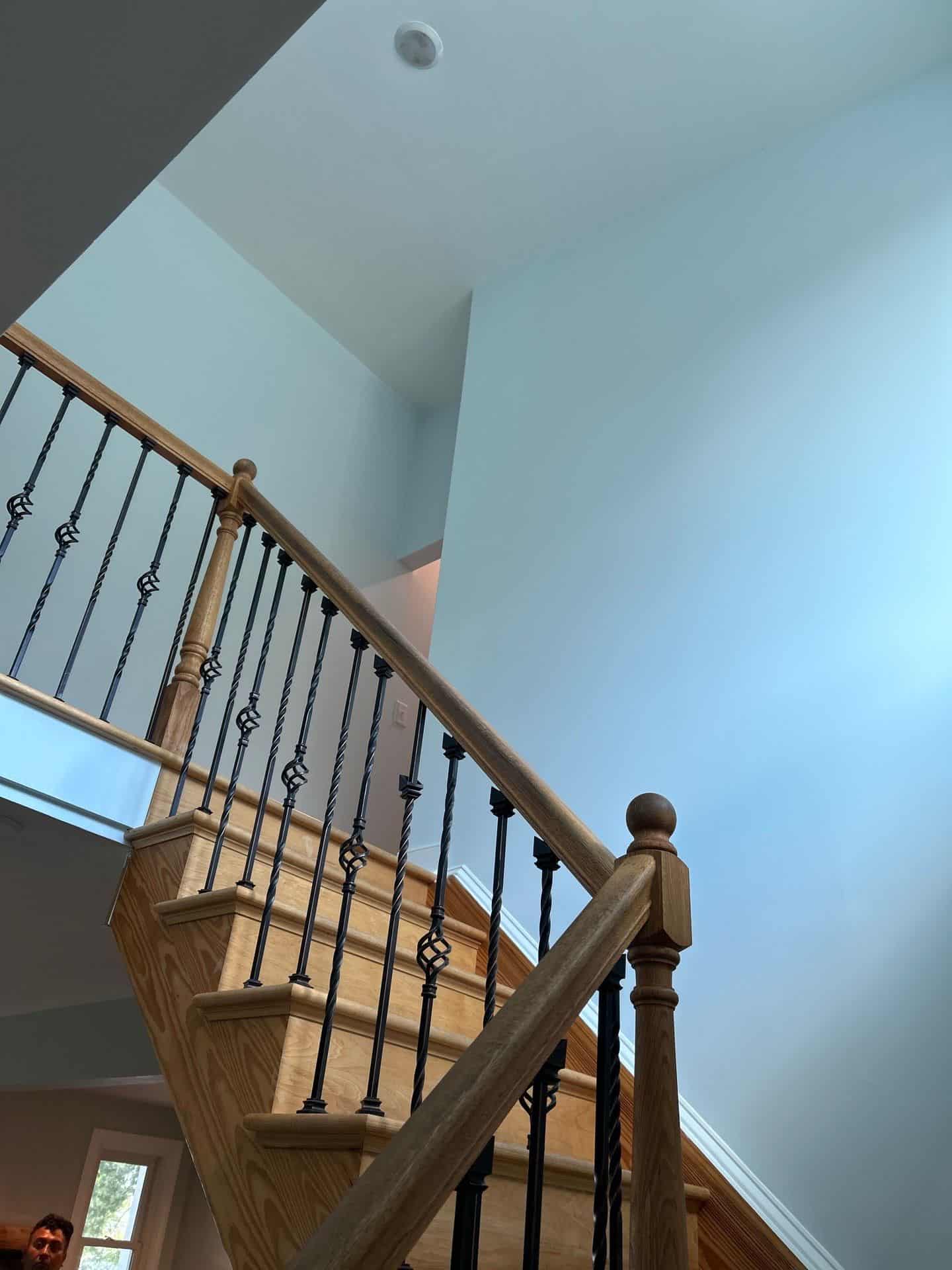 interior painting House interior painting, White walls and ceiling with exposed wood stairs - poor surface preparation