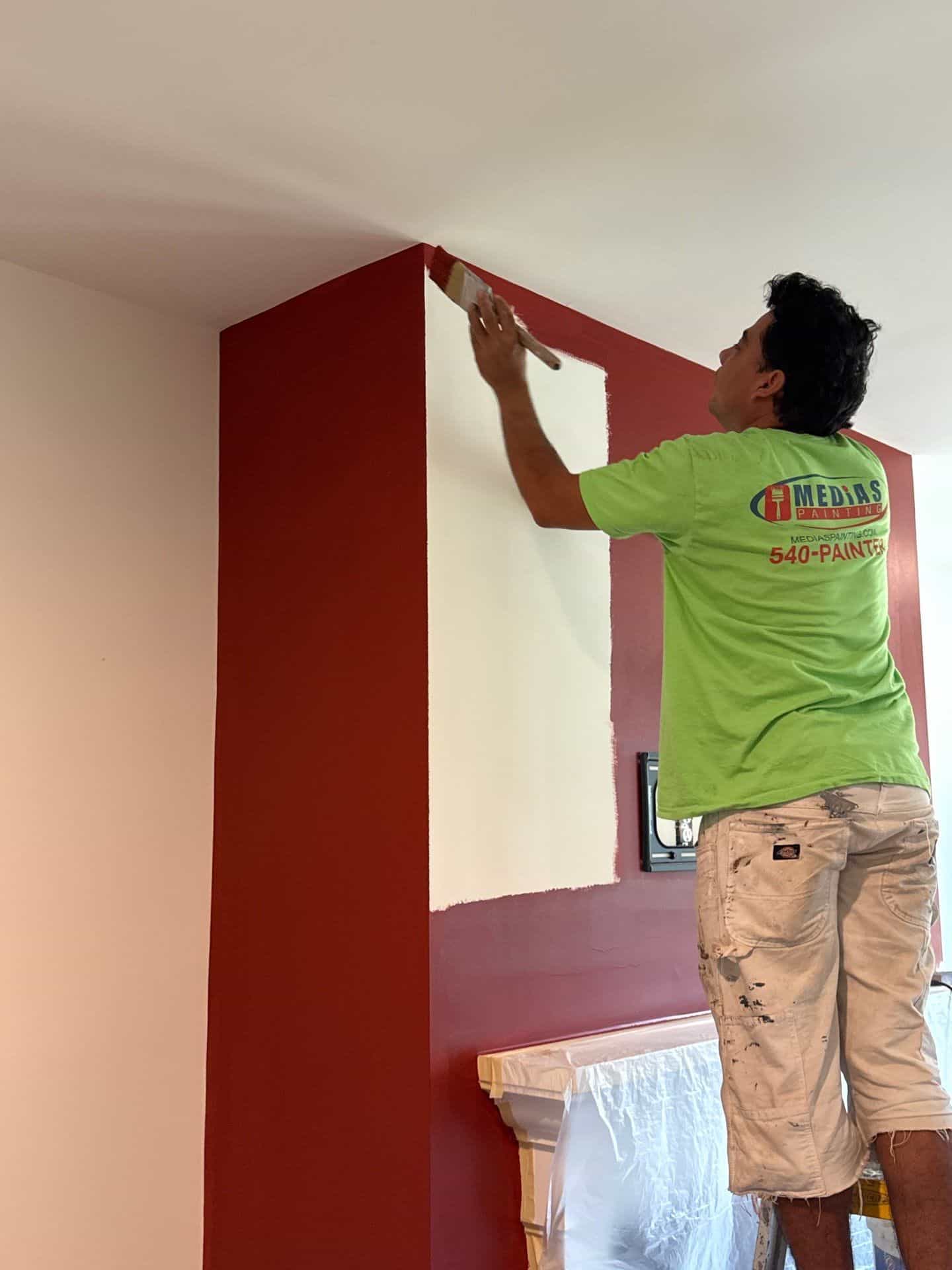 Interior painting Roller painting accent wall inside house