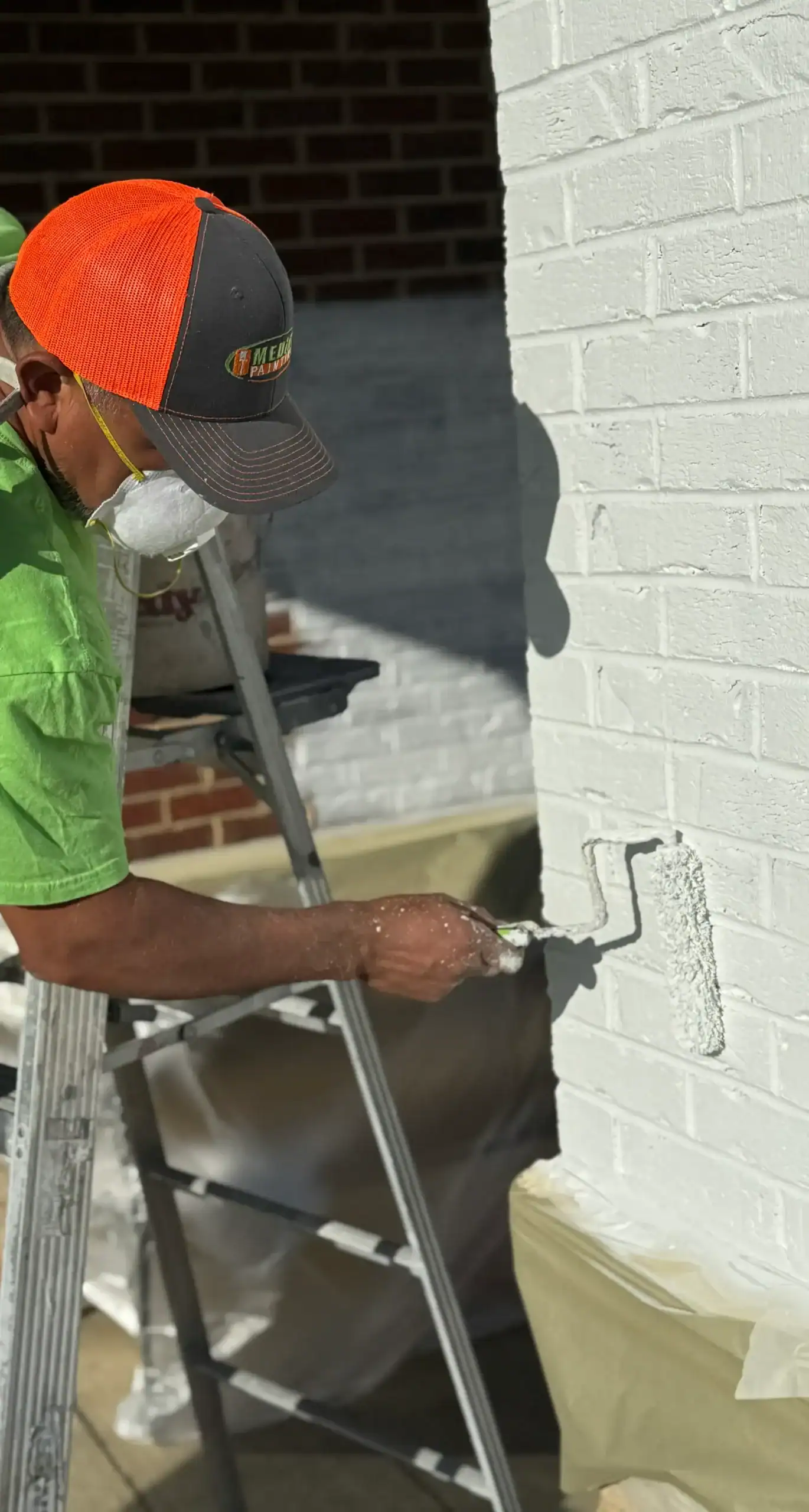 Brick painting Roller painting brick wall